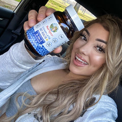 Jennifer G. holding product