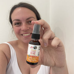 Sara D. holding product