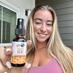 Mary V. holding product