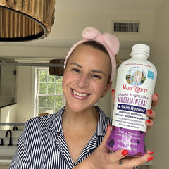 Audrey S. holding product