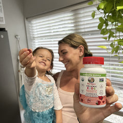 Jackie R. holding product