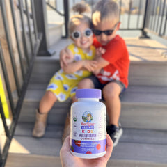 Natalie C. holding product