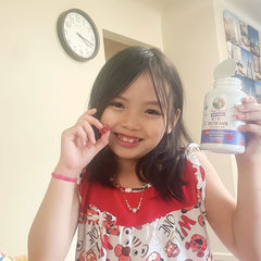 Nicole M. holding product