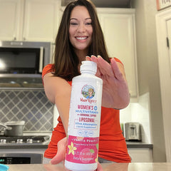 Sandra A. holding product