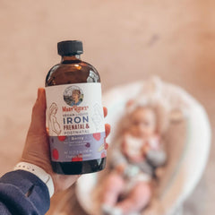 Erin S. holding product